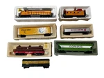 Assorted Trains Bachmann 866 Union Pacific Locomotive & Cabooses. Fixed Price $74.00.