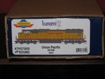 Athearn Genesis Ho Scale Tsunami 2 Union Pacific SD70M 4454. Fixed Price $244.95.
