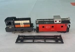 Vintage Marx New Haven Engine (for Parts) & York Central Caboose Ho Scale. Fixed Price $12.45.