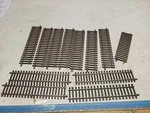 Atlas #7050 10" Inch Straight Track 11 Pieces, Short, 2-RAIL Brand New #22. Fixed Price $72.00.