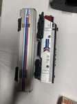 Ho Scale Athearn 3133 Amtrak F7A Diesel Locomotive # 157 + Passenger Car Unteste. Fixed Price $130.00.