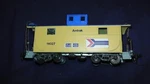 Amtrak Caboose Roundhouse ? Has Diecast Bottom. Fixed Price $40.50.