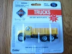 Boley Ho #185-400688 3-AXLE Stake Bed Truck -- Yellow. Fixed Price $10.49.