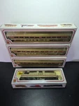 Bachmann Amtrak Locomotive 41-645-05 With Tree Cars 43-1022-05. Fixed Price $180.00.