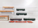 DO402-1# 4X Arnold Rapido Passenger Car Etc Drg 0339 3312 3362 3391 SG+3X Box. Fixed Price $54.89.
