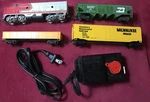 Pre-owned: Bachmann Diesel Locomotive F7A W/3 Cars And Model 6607 Transformer. Fixed Price $40.00.